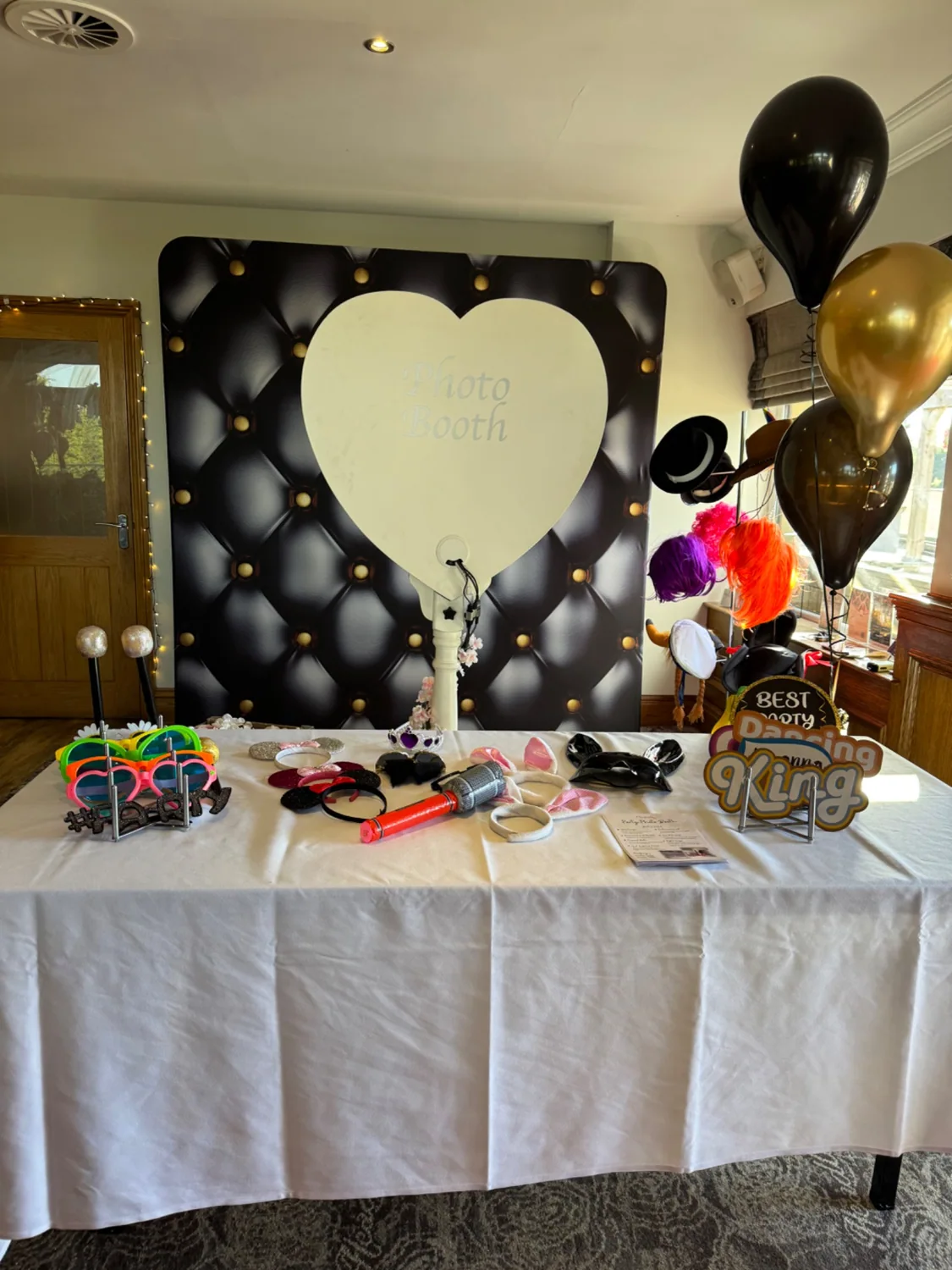 Rustic Heart photo booth with wedding props