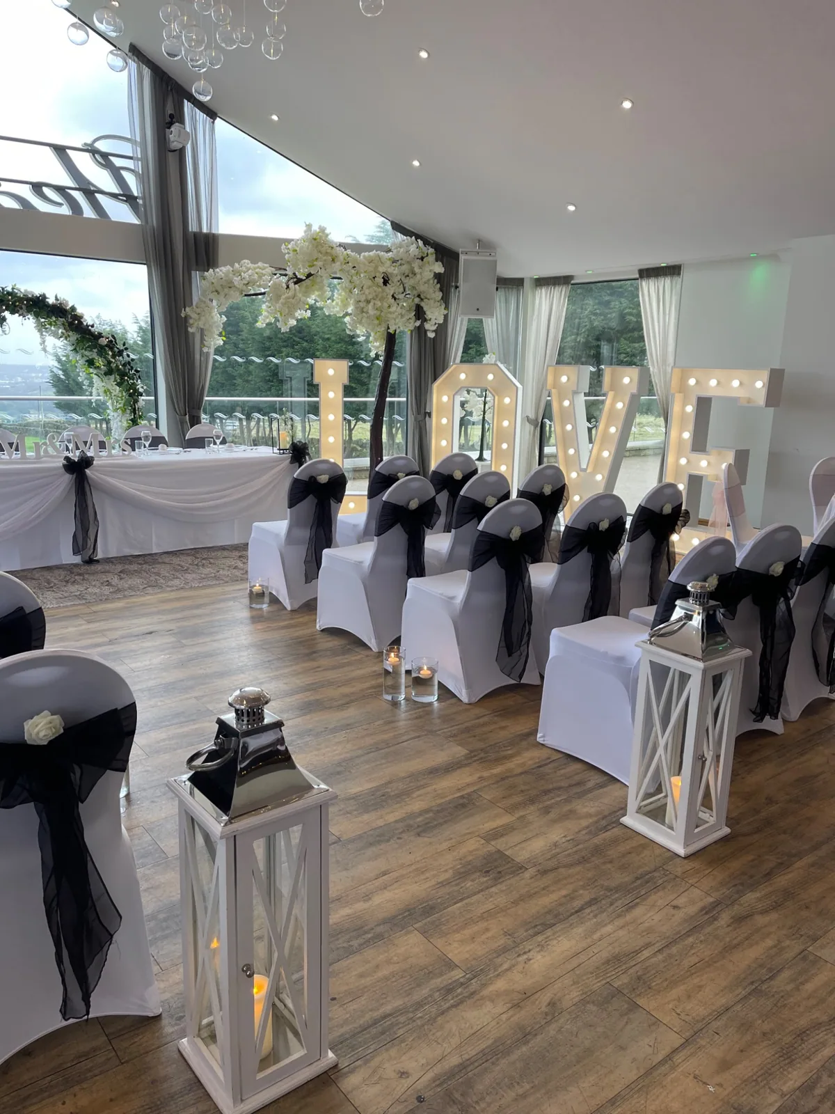 Wedding ceremony with illuminated LOVE letters